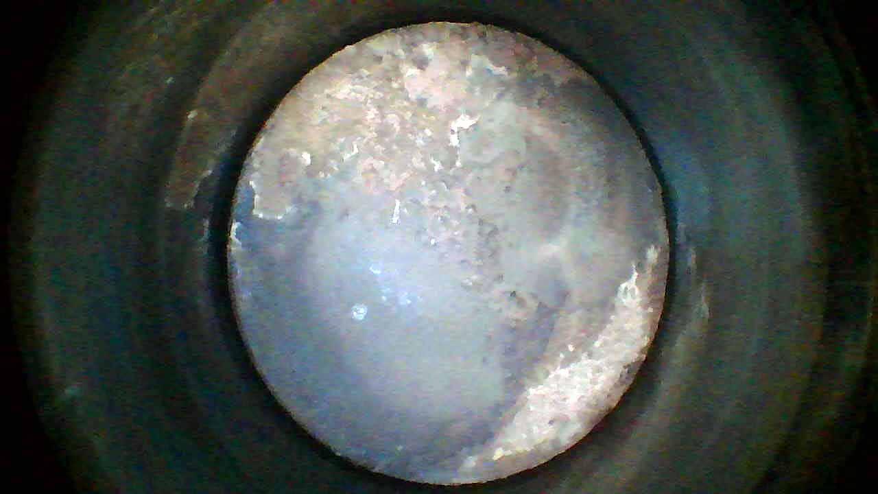 Borescope reference image: piston crown at bottom dead center